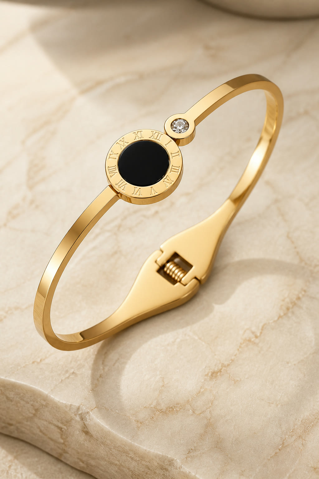 Gold Roman numeral medallion bangle with crystal accent